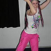 Me spinning for a friend\'s artwork, with my funky pink/black dreads!