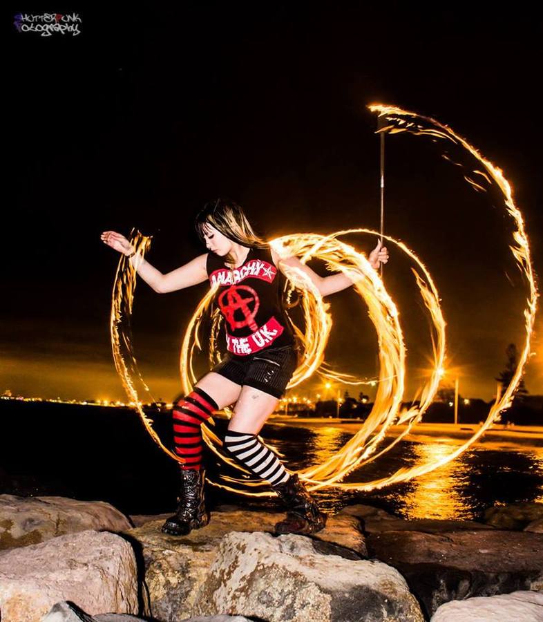 Fire twirling on the beach