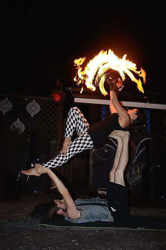 Acro with fire fans