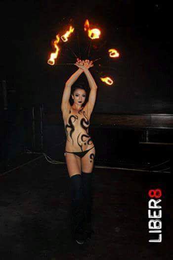Body paint and fire fans