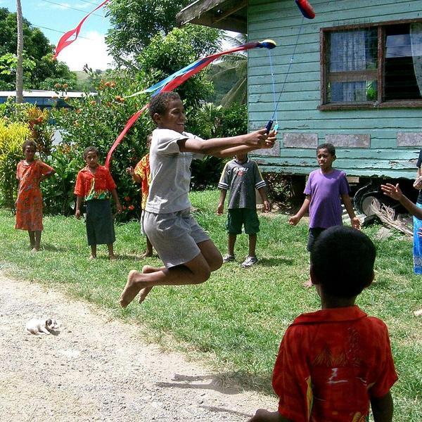 Fijian kids loving poi uploaded by kiwiandrea