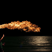 Fire blow over full moon