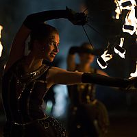 Smiling on fire fans