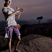 On top of a rotating drop