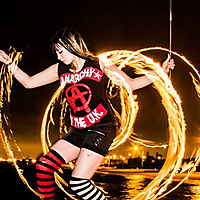 Fire twirling on the beach
