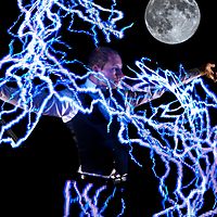 Lightning over the moon