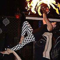 Acro with fire fans