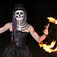 a fire spinning ghoul: