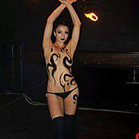 Body paint and fire fans